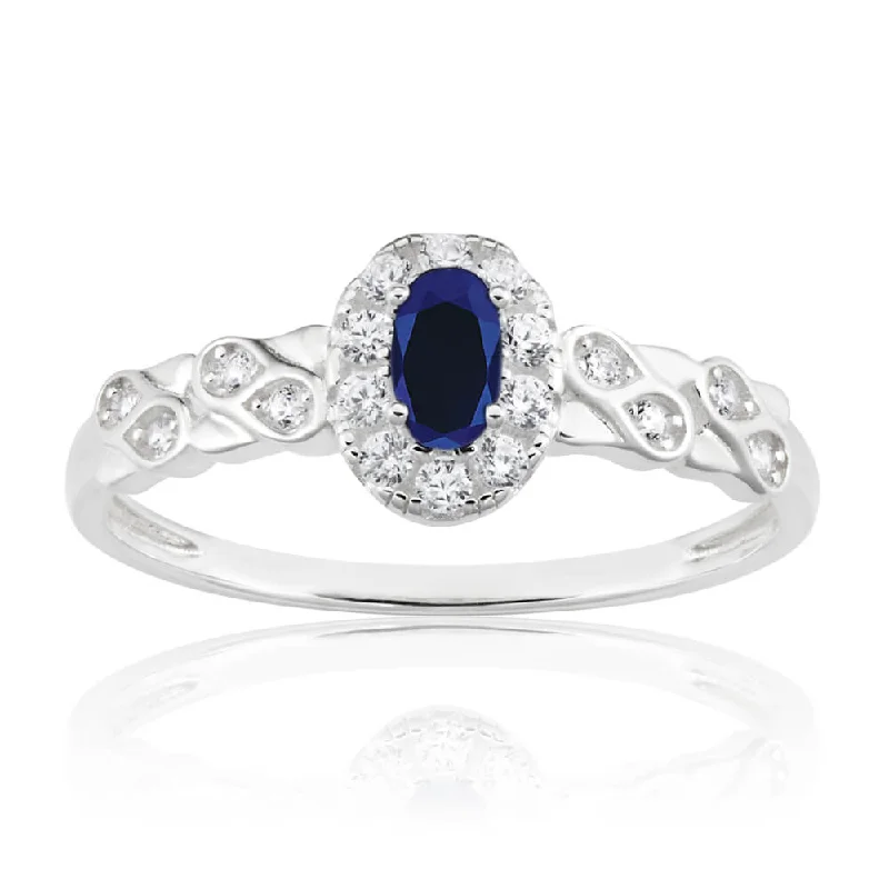 Layered design rings-Sterling Silver Oval Cut Created Sapphire and Cubic Zirconia Ring