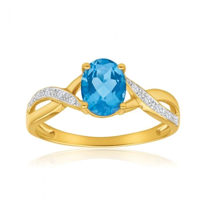 Victorian style rings-9ct Yellow Gold Blue Topaz and Diamond Cross Over Ring