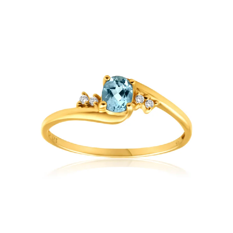 Bow knot rings-9ct Yellow Gold Blue Topaz + 4 Cubic Zirconia Ring